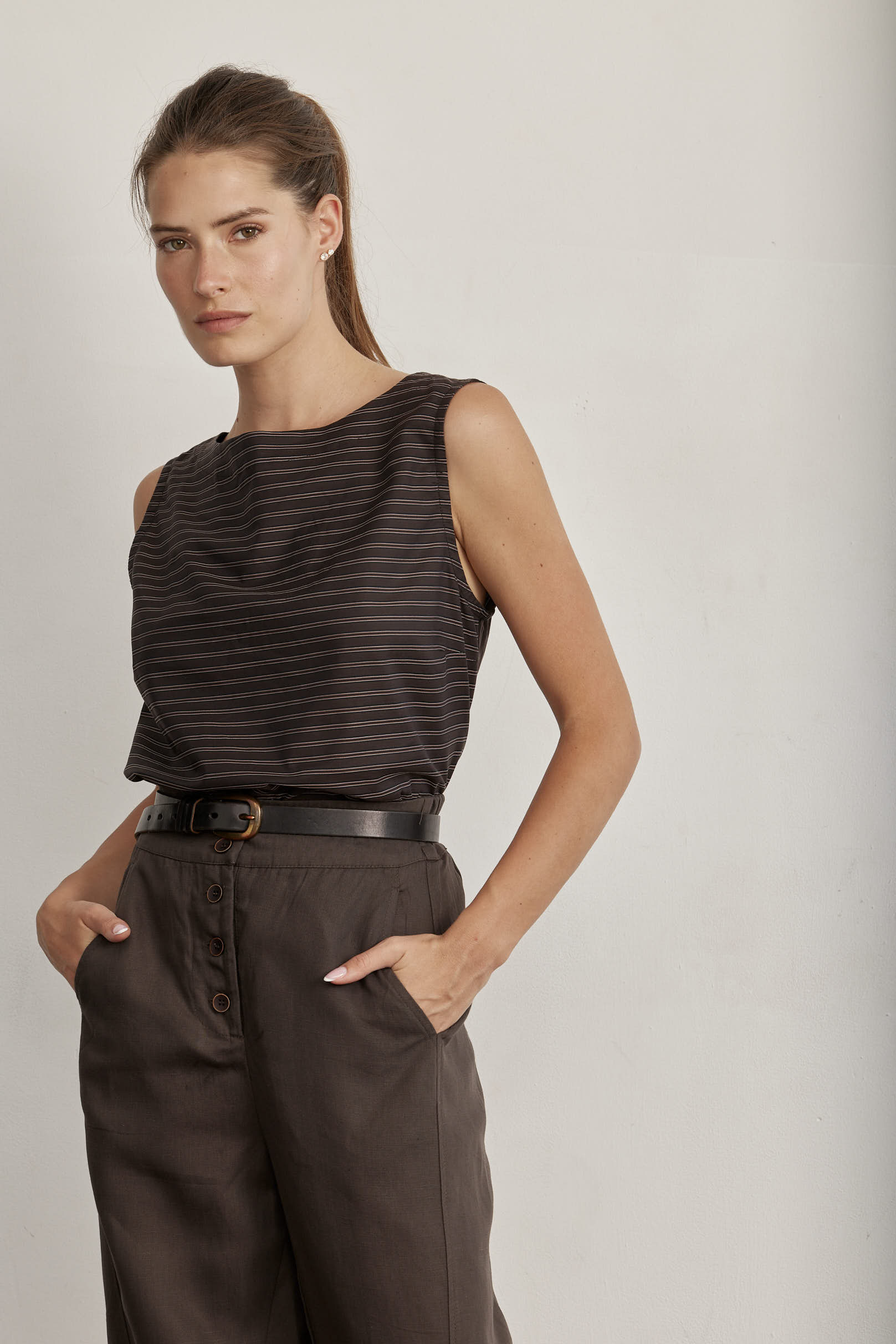 Black sleeveless top with horizontal stripe pattern