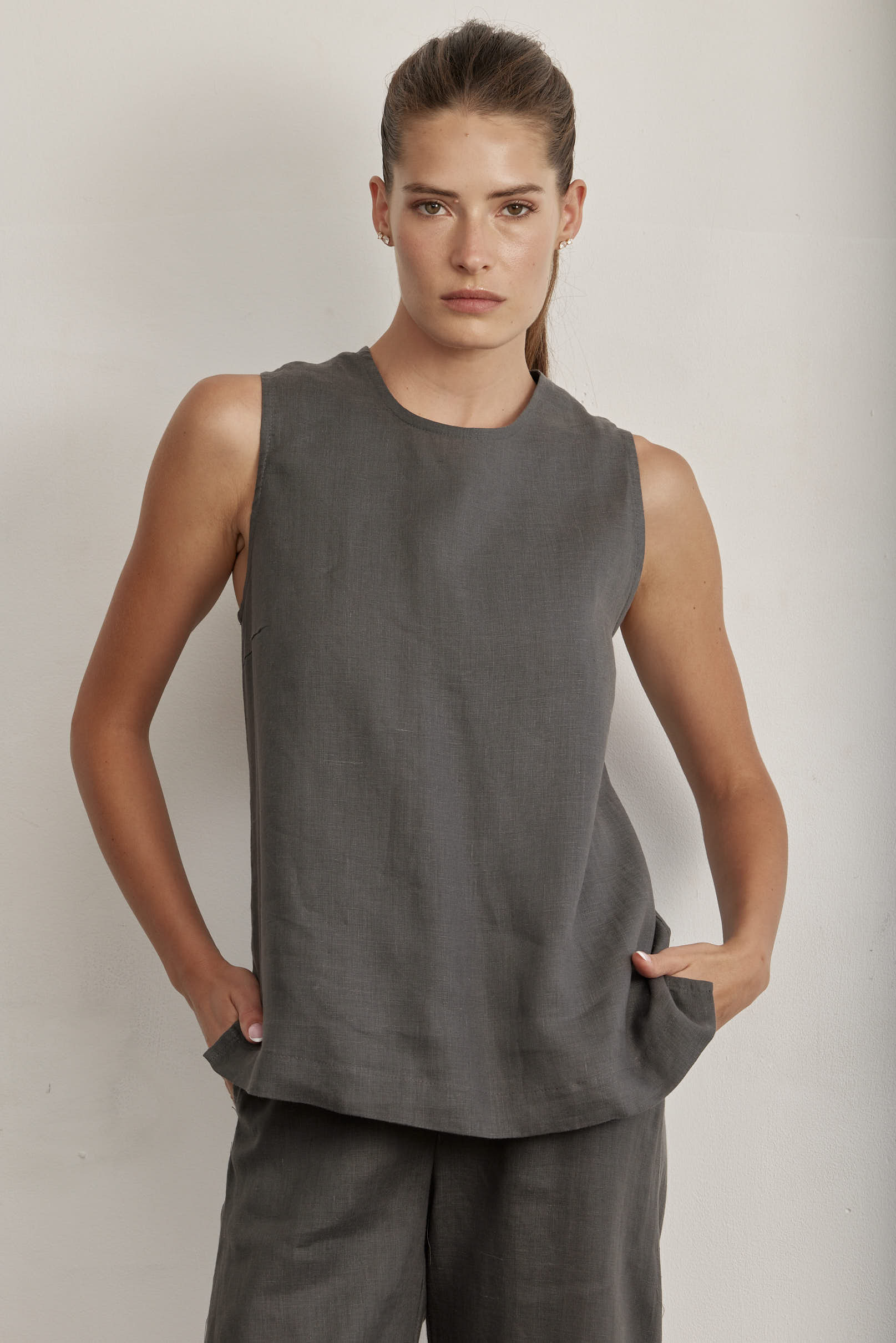Grey sleeveless linen tank top with side pockets